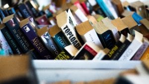 Boxes of books found in a Guardian Storage self storage unit using an easy storage hack for packing.