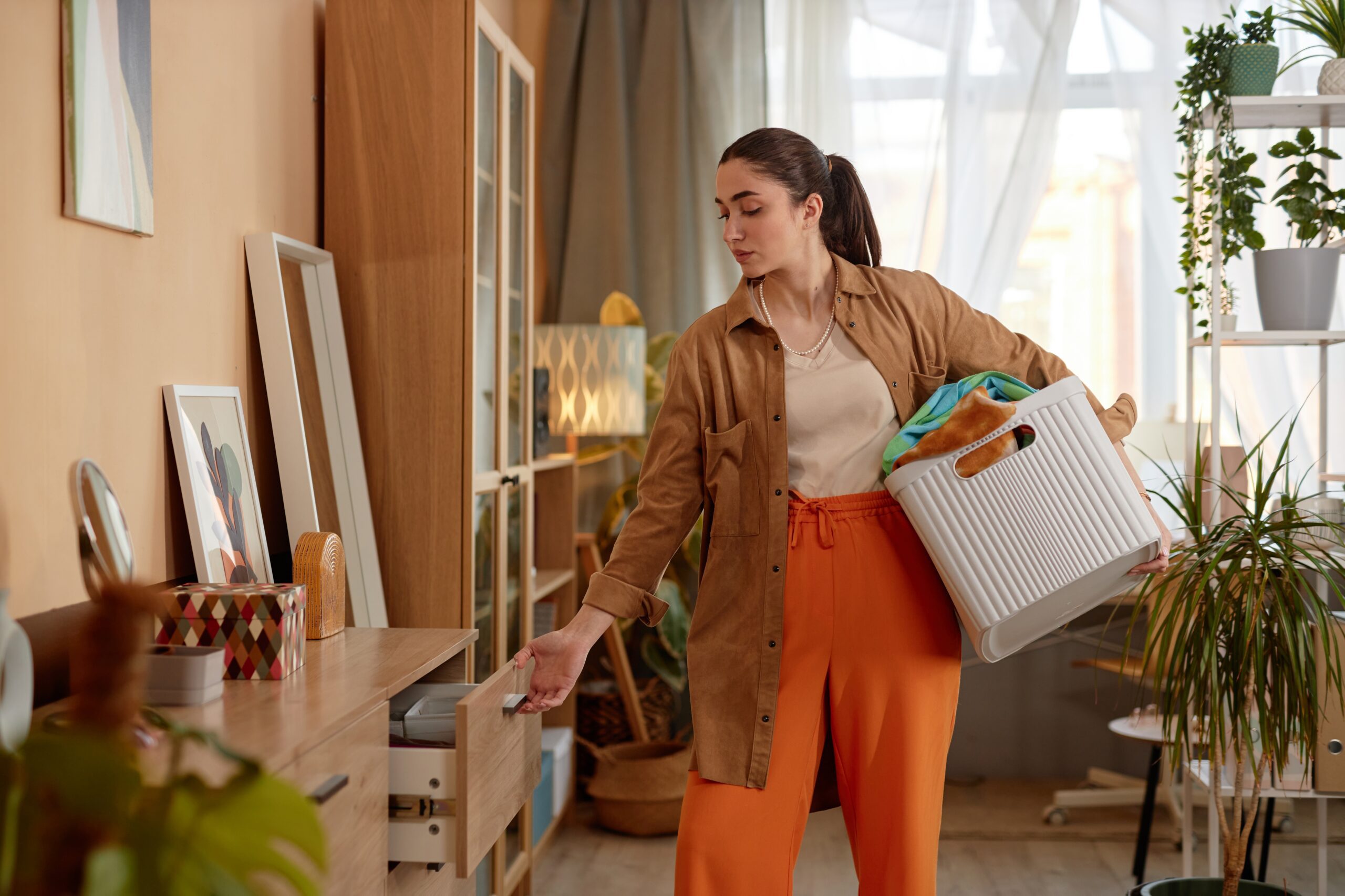 Guardian Storage home organization flow showing a family home with clear walking paths, organized storage, and uncluttered living spaces